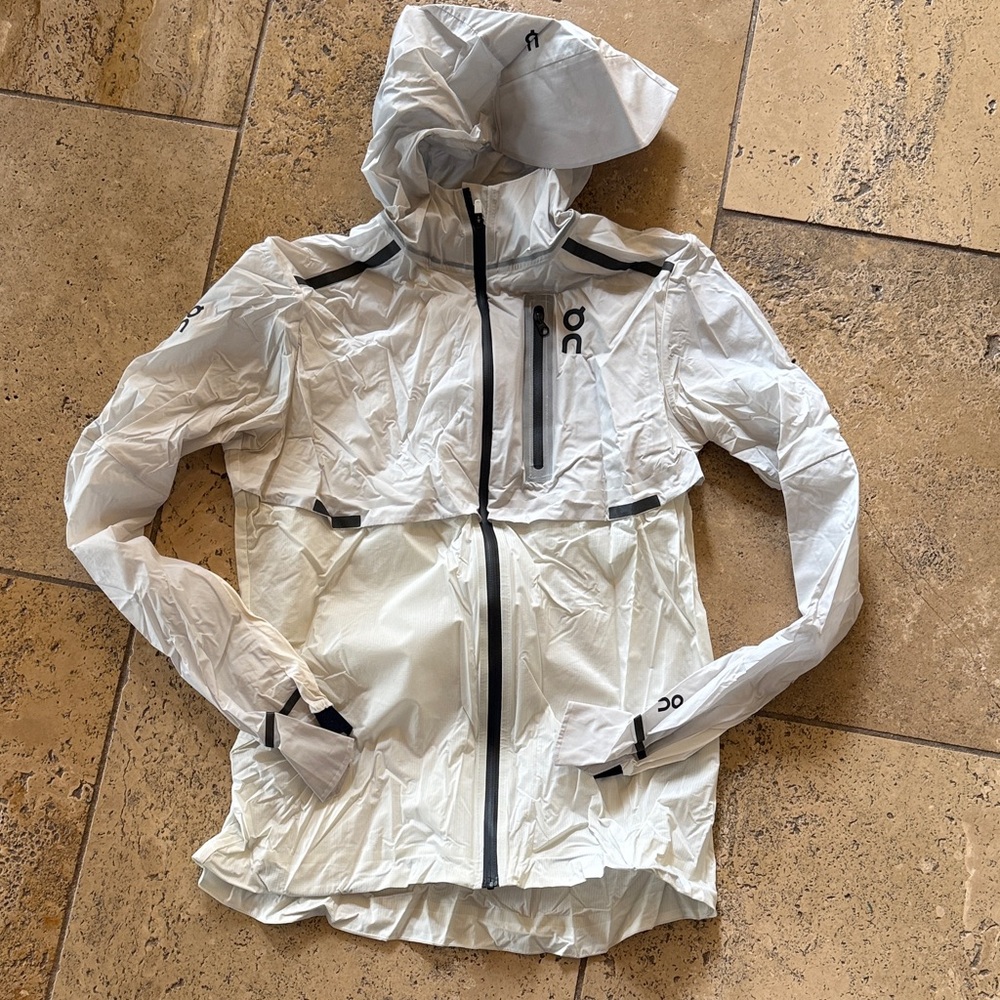 ON unisex waterproof hooded running jacket